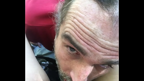 Horny slut licking pussy in public park